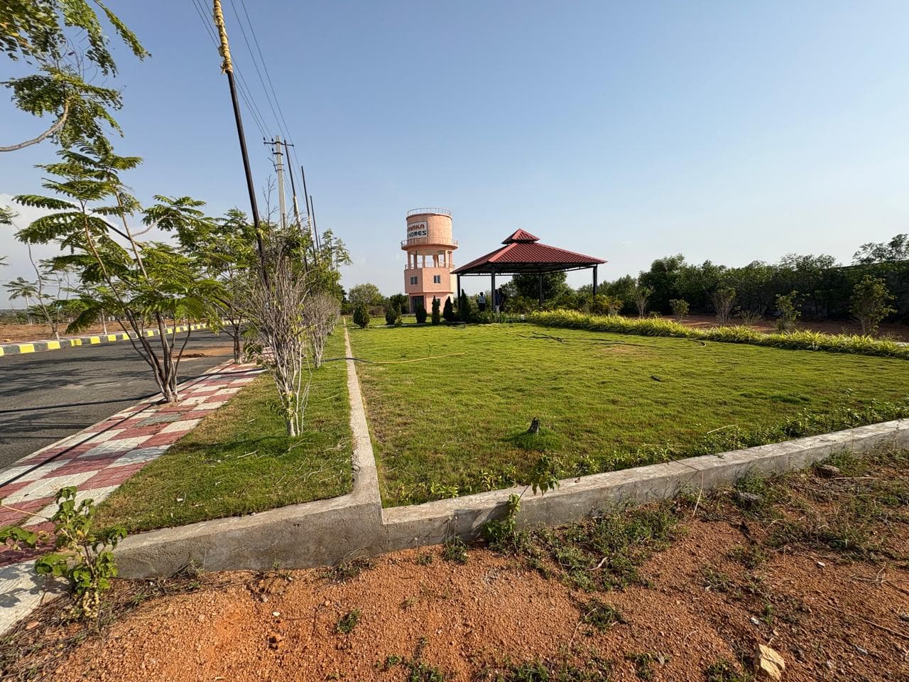 S.V.KANAKA MAPLE HOMES open plot layout in Warangal Highway — site photo 4