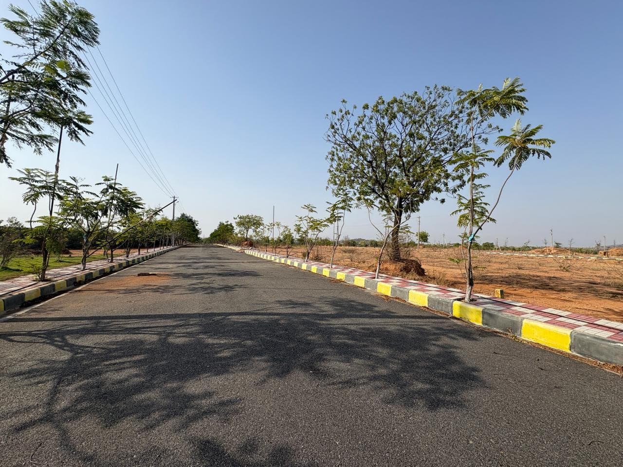 S.V.KANAKA MAPLE HOMES open plot layout in Warangal Highway — site photo 2